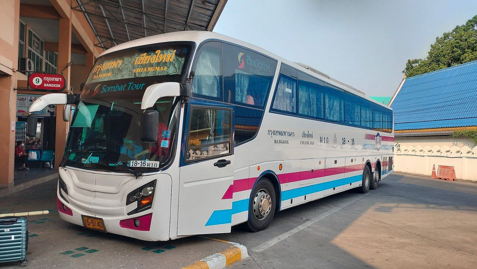 Intercity coach on the Bangkok to Chiang Mai route parked at a bus terminal bay