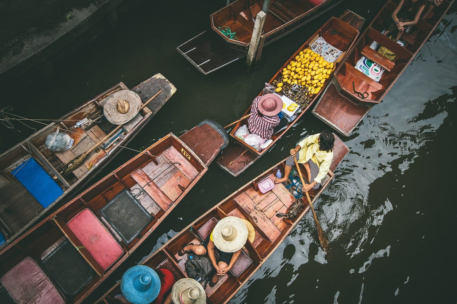 Overhead view of wooden vendor boats loaded with fruit at Damnoen Saduak floating market
